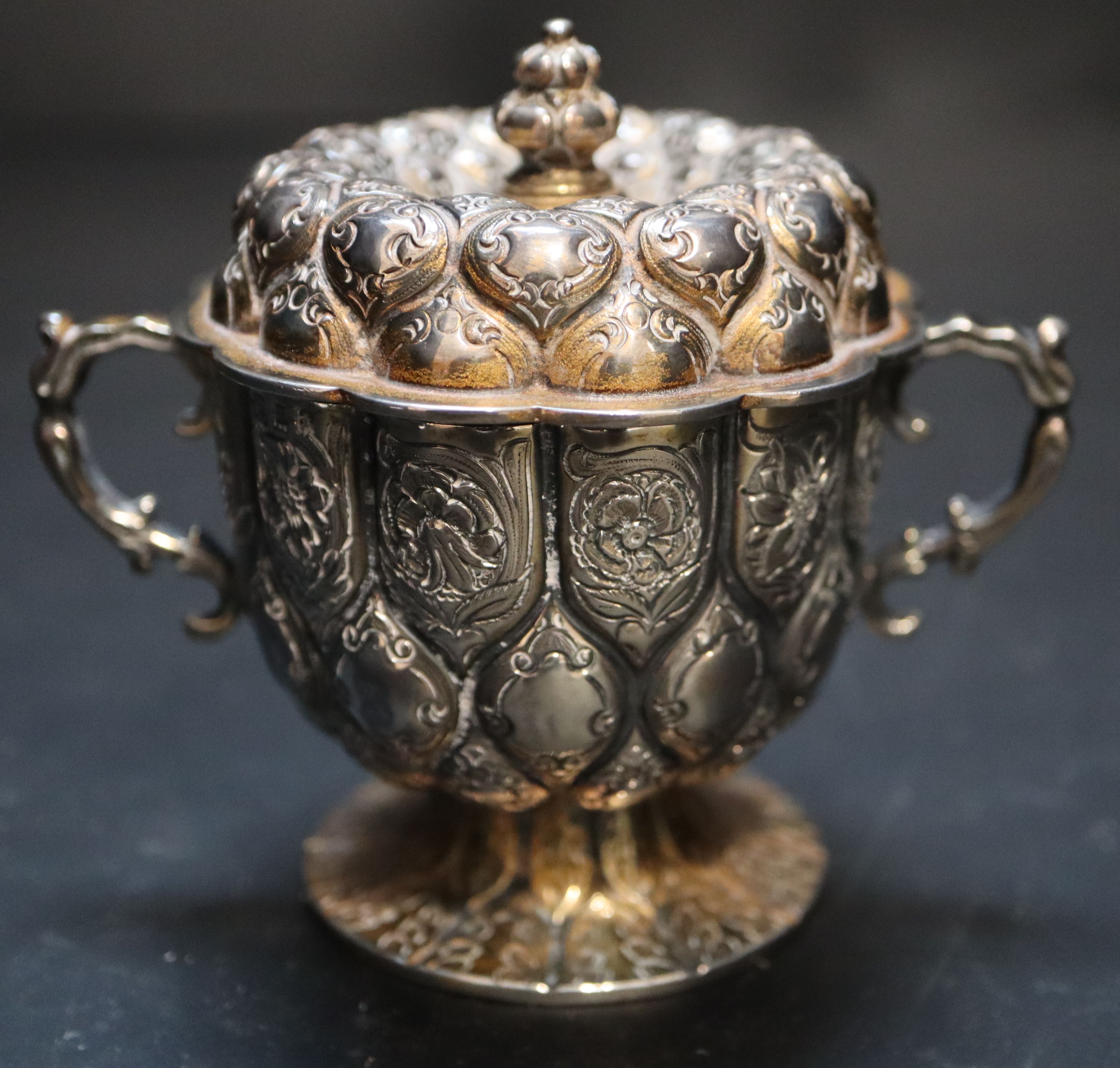 A George V 17th century style small silver two handled cup and cover, Goldsmiths & Silversmiths Co Ltd, London, 1924,
